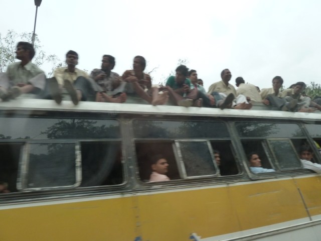 You think you're hard done by if you can't find a seat on the bus? In India it is normal practise to sit 'on' the bus - even on the motorway!