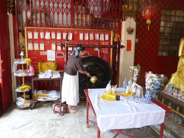 Ella is invited to bang the gong of happiness