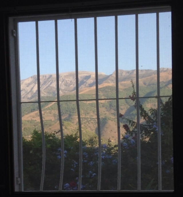 The view from my pillow - the security bars at the window are traditional in this area
